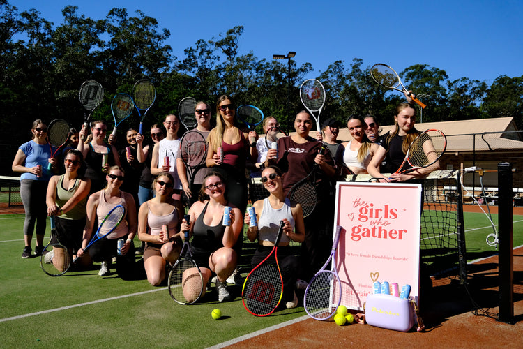 Central Coast women attending a Girls Who Gather social tennis event, a women's community event designed to help women make friends and build connections.