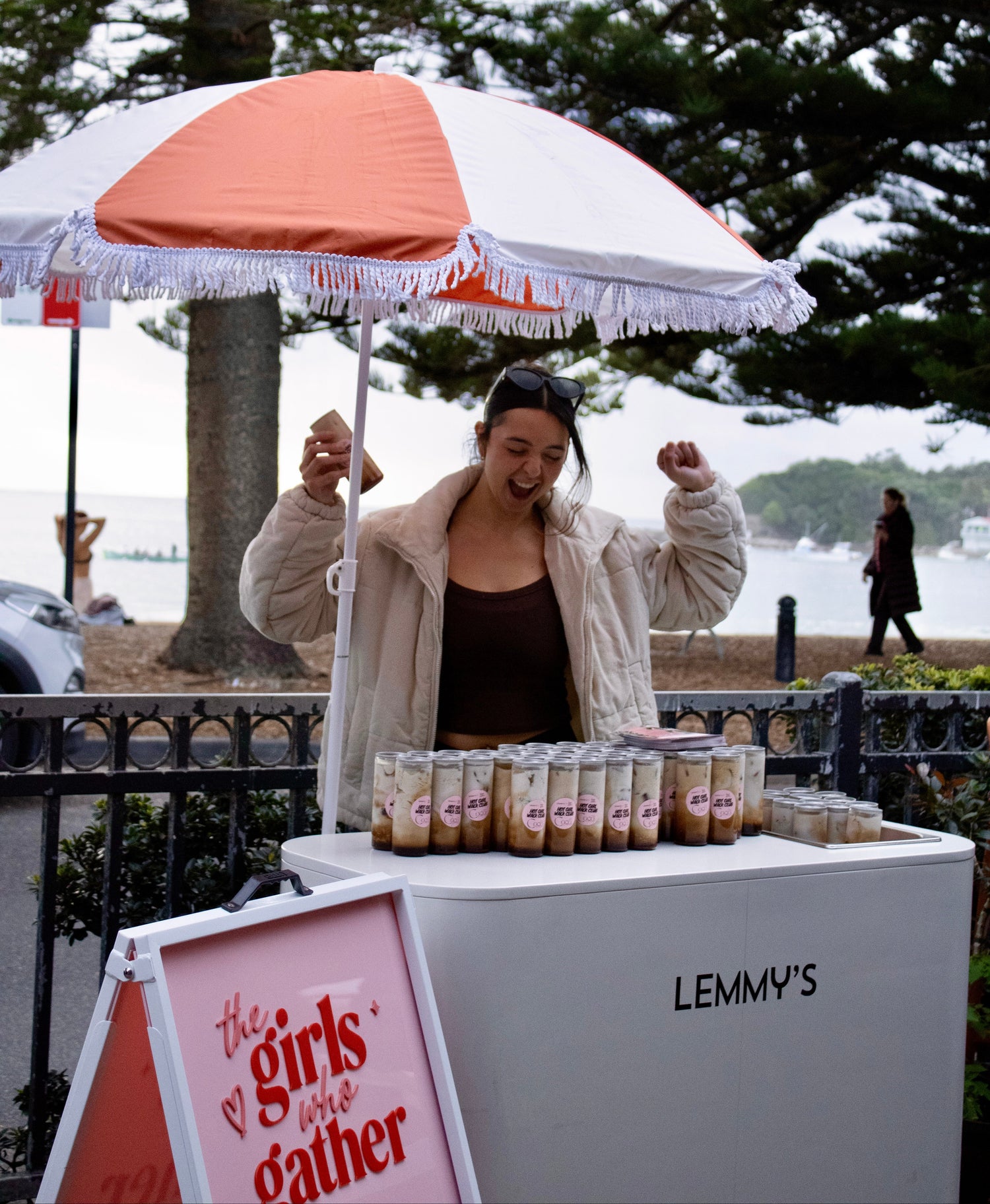 The Girls Who Gather Hot Girl Walk Club coffee station at LEMMY'S in Terrigal, serving complimentary iced coffees after the community walk. A welcoming space where women connect, meet new friends and enjoy coffee by the beach.